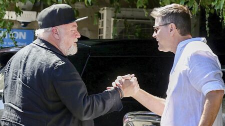 Kyle Sandilands sets tongues wagging about his future at KIIS FM as he holds meeting with new Nine radio owner Stu Laundy