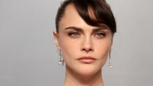 And the award for weirdest dress goes to…: Cara Delevingne steps out in a bizarre ‘muscle dress’ as she attends the Vanity Fair Oscars party