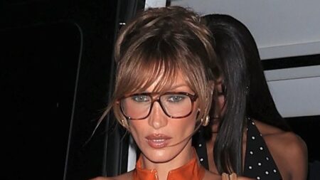 Bella Hadid shows off her VERY tiny waist as she steps out for dinner with friends in West Hollywood