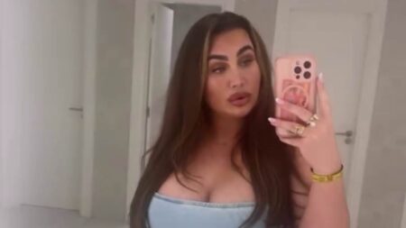 Lauren Goodger clarifies her relationship status with ex Charles Drury as she slips into skimpy blue minidress to jet off on holiday with him and their daughter Larose