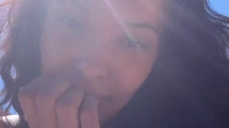 Maya Jama flaunts her gorgeous curves in a green bikini as she soaks up the sun in mystery exotic location