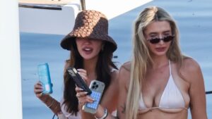 Liam Payne’s girlfriend Kate Cassidy stuns in white swimsuit with bikini-clad pal 17 months after star’s death