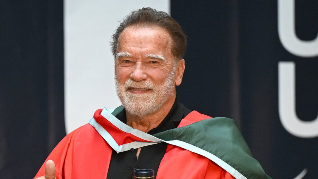 Arnold Schwarzenegger gets honorary doctorate in Northern Ireland after trolling Trump’s defunct university