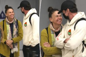 Hugh Jackman and Sutton Foster look in love more than ever while arriving at LAX