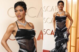 Teyana Taylor wears a Chanel feathered gown on the Oscars 2026 red carpet