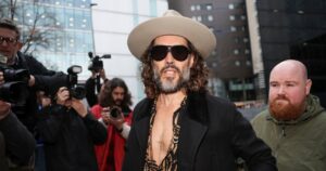 UK comedian Russell Brand trial on rape, sex assault charges delayed