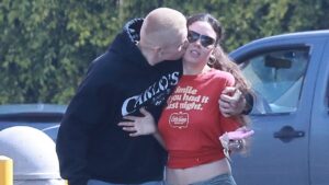 Aussie rapper The Kid Laroi can’t keep his hands off new girlfriend Sophie HM as they step out in Los Angeles