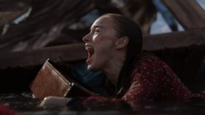 ‘Thrash’ Review: Phoebe Dynevor Gives Birth in Floodwaters Teeming With Sharks in Preposterous but Enjoyable Netflix Pulp