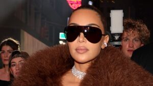 Kim Kardashian roasted over ‘ridiculous’ outfit at Gucci show as she sits front row with Anna Wintour and Mariah Carey