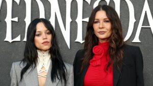 Catherine Zeta-Jones, 56, showcases her timeless beauty as she joins abs-flashing co-star Jenna Ortega, 23, at event for their Netflix hit Wednesday