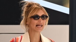 Bella Hadid strips down to tiny red bikini as she soaks up the sun aboard a luxury yacht in Saint-Tropez
