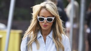 Jackie ‘O’ Henderson steps out in $11,000 designer outfit – as fallout from her exit from ARN continues with three more staffers cut