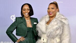 Queen Latifah has rare red carpet appearance with partner Eboni Nichols and son at American Music Awards 2026