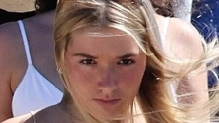 Harper Beckham, 14, steals her mum Victoria’s style with a satin dress from her collection and a £2,200 Bottega Veneta bag as she departs her parents’ £16m yacht for a swanky lunch with her family in Formentera
