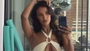 Maya Jama shows ex Rúben Dias what he’s missing once again as she sets pulses racing in a daring cut out white swimsuit in sizzling new snaps