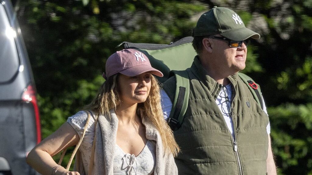 Mr Tumble, 55, arrives at hotel with co-star girlfriend Samantha Dorrance, 34, after the ‘madly in love’ CBeebies icon admitted he was ‘workaholic’ and struggled to find ‘the one’