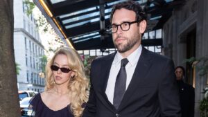 Sydney Sweeney, 28, holds hands with boyfriend Scooter Braun, 44, after he revealed what he REALLY thinks of her X-rated Euphoria scenes
