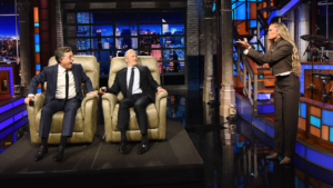 Jon Stewart Surprises Stephen Colbert With a Recliner and Guest Performer in Final ‘Late Show’ Appearance