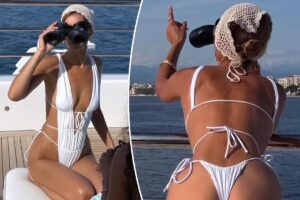 Bella Hadid’s skimpy swimsuit is completely open on the back and sides