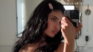 Kylie Jenner reveals her jaw-dropping abs in tiny string bikini after whisking friends away for paradise island trip