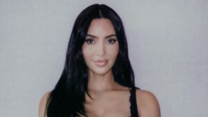 Lewis Hamilton shares polaroid snap of girlfriend Kim Kardashian posing with his race helmet during show-stealing Monaco Grand Prix stint after he broke his silence on their romance