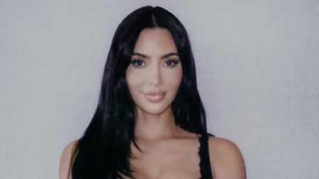 Lewis Hamilton shares polaroid snap of girlfriend Kim Kardashian posing with his race helmet during show-stealing Monaco Grand Prix stint after he broke his silence on their romance