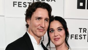 Katy Perry and boyfriend Justin Trudeau make their red carpet debut as they put on a VERY cozy display at her NYC concert film premiere