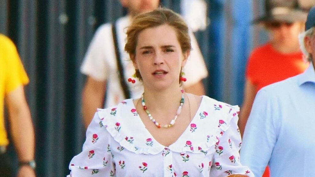 Emma Watson heads out in a pyjama-inspired floral ensemble as she grabs breakfast to go while on holiday in Venice