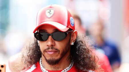Lewis Hamilton debuts a new hairstyle as he arrives in the paddock ahead of the Barcelona Grand Prix – as girlfriend Kim Kardashian jets back to LA