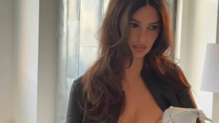 Emily Ratajkowski suffers huge backlash over ‘disturbing’ topless photoshoot as she ‘breastfeeds’ a doll while drinking wine