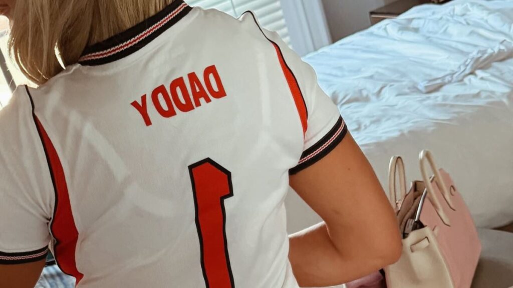 Jordan Pickford’s wife Megan squeezes into her 7-year-old son’s England shirt after airline lost her suitcase while Kate Kane heads to the Dallas stadium ahead of the Three Lions’ first World Cup match