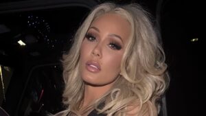Bunnie XO shows off her figure in a plunging bralette top for girls’ night out amid shock Jelly Roll divorce