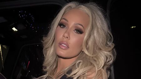 Bunnie XO shows off her figure in a plunging bralette top for girls’ night out amid shock Jelly Roll divorce