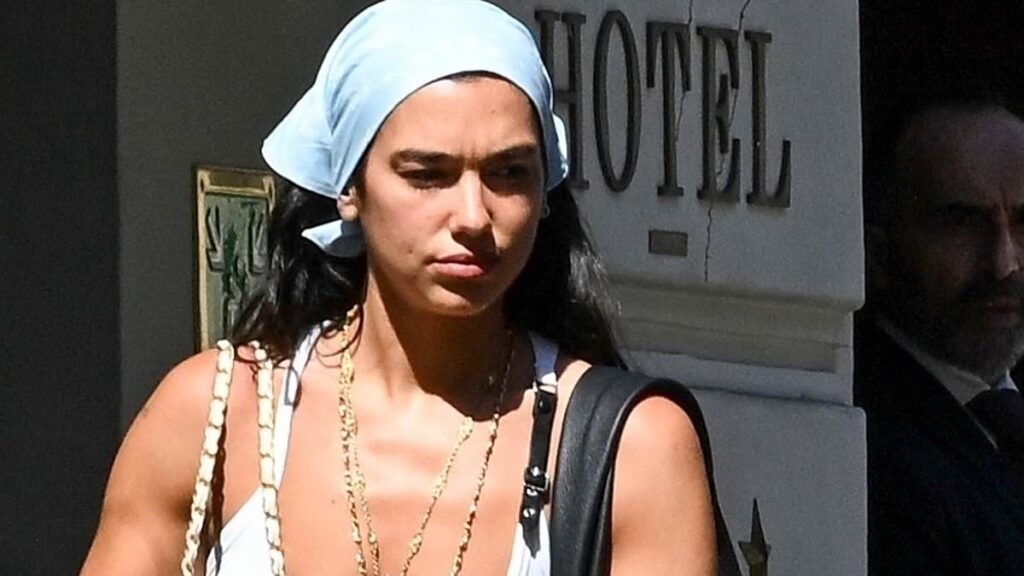 Dua Lipa and Callum Turner make a stylish exit from their Rome honeymoon in a £200k Porsche after idyllic Italian wedding