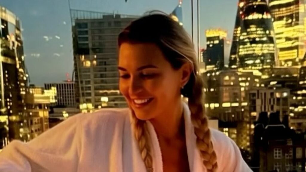 Christine McGuinness poses topless as she sleeps on the balcony of a London apartment and says ‘it was happy hour from sunrise to sunset’