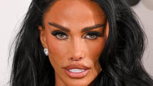 Katie Price shows off the results of her corrective lip surgery as she wows in figure hugging black dress at the official launch of her new Sky documentary Nothing To Hide
