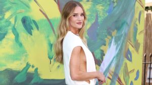Rosie Huntington-Whiteley dazzles in a cut-out white gown as she leads the stars at The Serpentine Gallery Summer Party