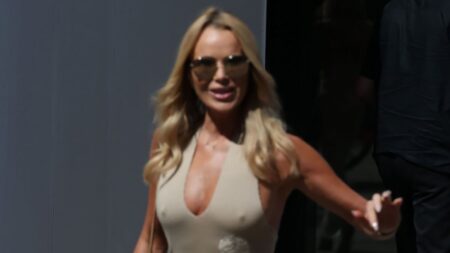 Amanda Holden goes braless in a plunging gown while Hannah Waddingham battles soaring temperatures at Ride Or Die photocall as stars sizzle in the heatwave