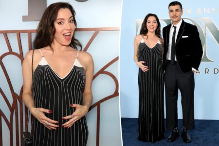 Aubrey Plaza cradles her baby bump while supporting partner Chris Abbott at Tony Awards 2026