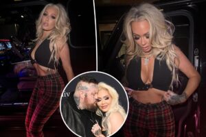 Bunnie Xo shows off curves in plunging top during girls’ night out amid Jelly Roll divorce