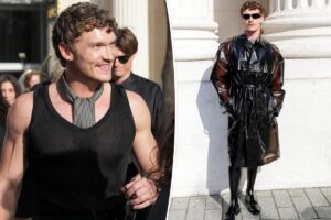 Connor Storrie wears head-to-toe PVC during heat wave at Saint Laurent Paris Fashion Week show