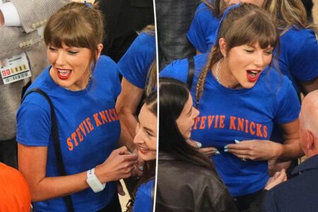 Taylor Swift reps ‘Stevie Knicks’ with her shirt at Game 4 of the Knicks vs. Spurs NBA Finals