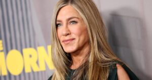 Jennifer Aniston’s Summer Uniform Includes This Tried-and-True ‘Basic’ Top That Belongs in Everyone’s Rotation