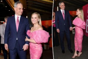 Reese Witherspoon shares rare PDA moment with billionaire boyfriend Oliver Haarmann at ‘Elle’ premiere