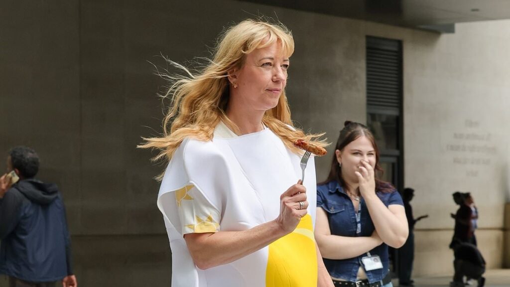 Sara Cox dresses in a fried egg costume as she films fun promo skit days before the launch of her Radio 2 Breakfast Show