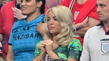 Jude Bellingham’s girlfriend Ashlyn and Jordan Pickford’s wife Megan bite their nails as England face tense second half while Harry Kane’s wife Kate rallies team with sweet banner