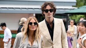 New mum Sienna Miller, 44, looks chic in a linen suit as she joins fiancé Oli Green, 29, and glamorous Poppy Delevingne on day six of Wimbledon