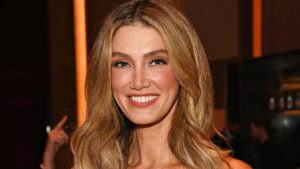 Delta Goodrem looks pretty in pink at the Attitude Pride Awards in London after Eurovision heartbreak – as she teases exciting new chapter