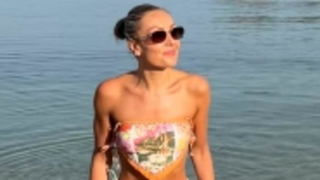 Amy Dowden, 35, poses in a bikini and reveals being put into an early, medically induced menopause alongside rounds of chemotherapy caused broken bones and muscle loss