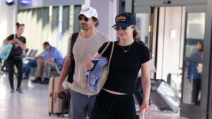 Gigi Hadid jets out of NYC with Bradley Cooper the day after Taylor Swift and Travis Kelce’s wedding (and dodge question about the nuptials)